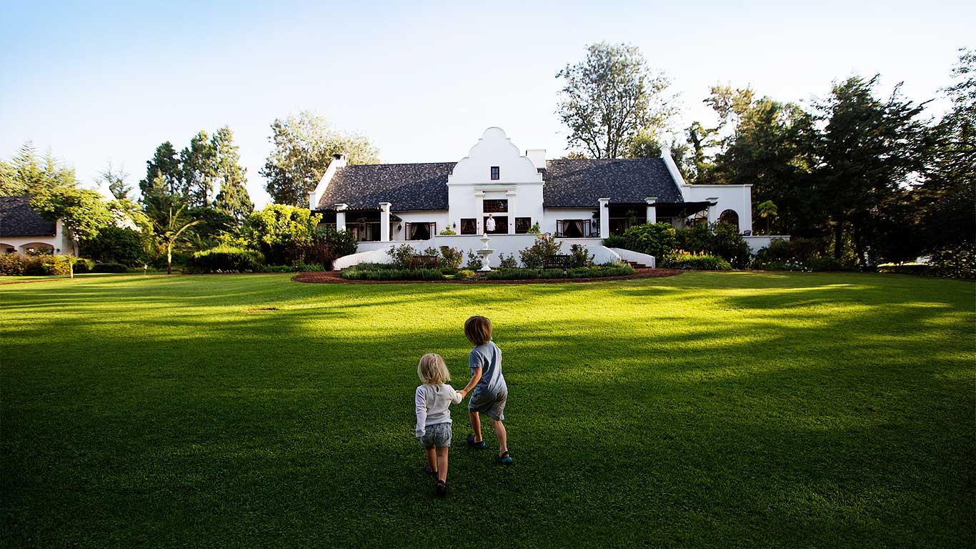The Manor Exterior Main Manor House with children